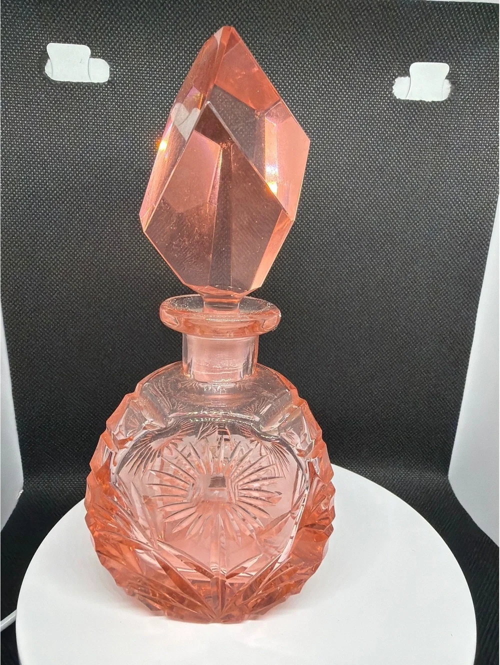 Pink cut glass decanter with stopper